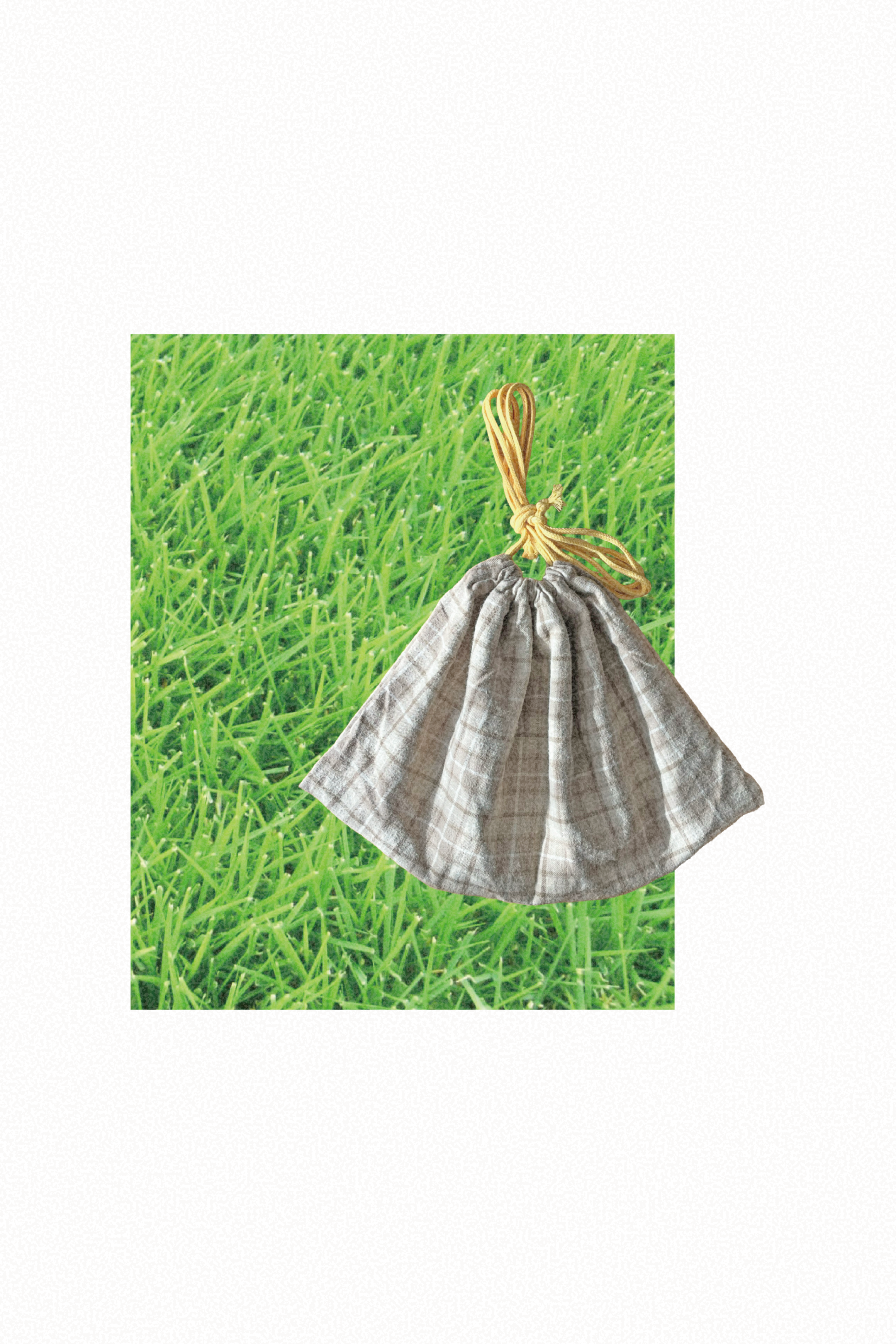 肩にかけても手に持っても使える紐の長い巾着バッグ